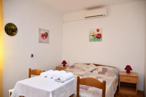 Postel nebo postele na pokoji v ubytování Apartments Josip