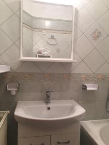 Kúpeľňa v ubytovaní ROSE Apartman