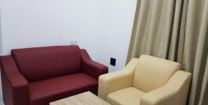 Area soggiorno di Duqm Suites