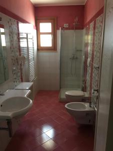Uma casa de banho em Santa Caterina Resort