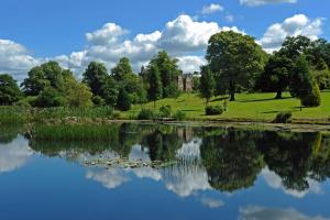 a view of a lake in front of a building at No 1 Ramageton in Hurlford