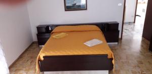 A bed or beds in a room at Civico 27 - In Terrazza