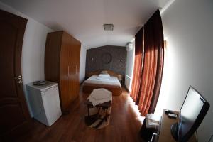 Postel nebo postele na pokoji v ubytování Vila Trandafir
