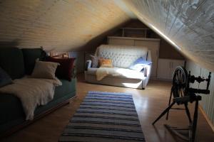 Postel nebo postele na pokoji v ubytování Posti Holiday Home