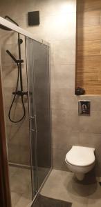 Kúpeľňa v ubytovaní Apartament metro rondo Onz