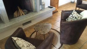 A seating area at Ferienwohnung Rustico ai Monti