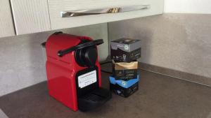 Coffee and tea making facilities at Ferienwohnung Rustico ai Monti