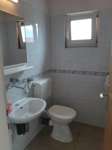 Koupelna v ubytování Apartment Mia