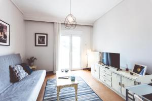 Televízia a/alebo spoločenská miestnosť v ubytovaní Comfy & Relaxing Apartment