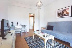 Televízia a/alebo spoločenská miestnosť v ubytovaní Comfy & Relaxing Apartment