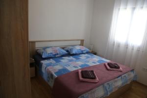 Postel nebo postele na pokoji v ubytování Apartment Drazan