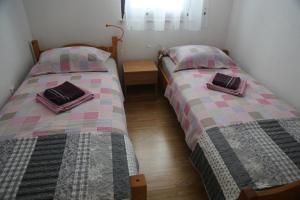 Postel nebo postele na pokoji v ubytování Apartment Drazan