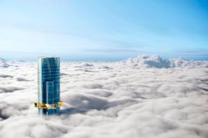 a skyscraper in the middle of the clouds at CLLIX Australia 108 Apartments in Melbourne