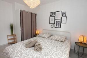 Cama ou camas em um quarto em Résidence La Source