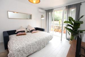 Cama ou camas em um quarto em Résidence La Source