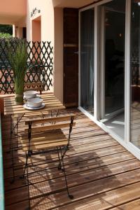 Uma varanda ou terraço em Résidence La Source