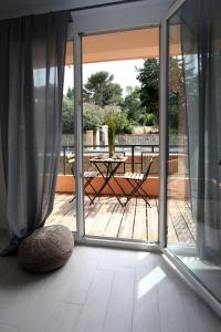 Uma varanda ou terraço em Résidence La Source