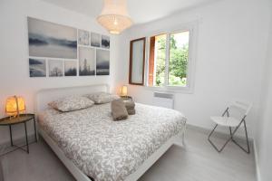 Cama ou camas em um quarto em Résidence La Source