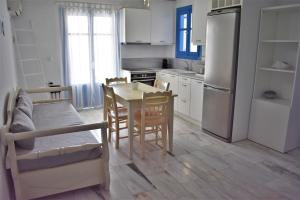 A kitchen or kitchenette at Arsinoi Apartments