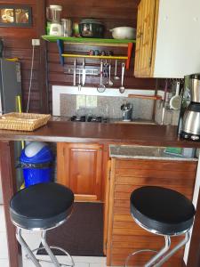 A kitchen or kitchenette at Gite Manmans