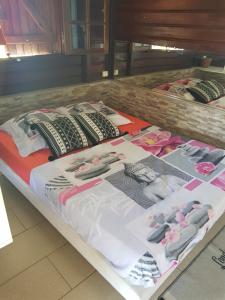 A bed or beds in a room at Gite Manmans