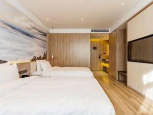 Ένα ή περισσότερα κρεβάτια σε δωμάτιο στο Atour Hotel Hefie Binghu Yingtai City Branch +8 φωτογραφίες