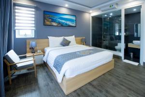 Voodi või voodid majutusasutuse Dang's Hotel toas