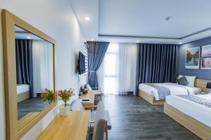 Voodi või voodid majutusasutuse Dang's Hotel toas
