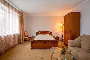 
Кровать или кровати в номере Отель Уют

