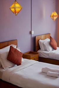 Postel nebo postele na pokoji v ubytování Bodhi Guest House + 37 fotografií