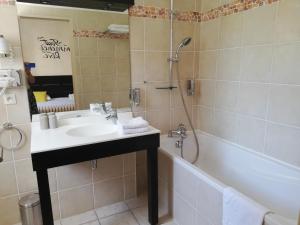 Koupelna v ubytování hôtel Le Synaya