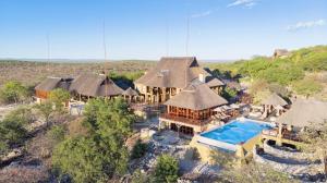 an aerial view of a resort with a swimming pool at Epacha Game Lodge & Spa in Okaukuejo