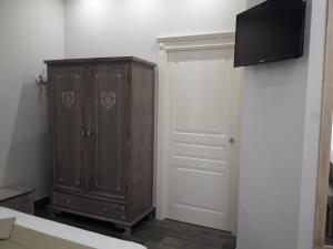 TV a/nebo společenská místnost v ubytování veronica's b&b