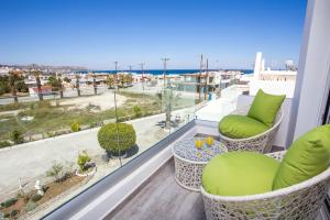 Posedenie v ubytovaní Ammos Luxury Suites