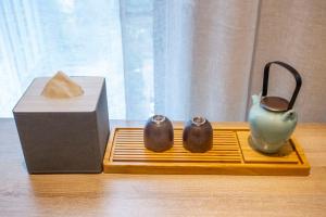 Příslušenství pro přípravu čaje a kávy v ubytování Atour Hotel Xi'an Gaoxin Jinye Road Branch
