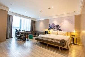 Postel nebo postele na pokoji v ubytování Atour Hotel Xi'an Gaoxin Jinye Road Branch