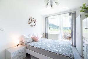 Postel nebo postele na pokoji v ubytování Mateja House - Apartments in Žirovnica