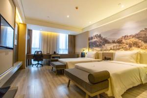 Postel nebo postele na pokoji v ubytování Atour Hotel Xi'an Gaoxin Jinye Road Branch