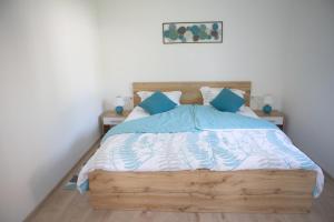 Кровать или кровати в номере Sweet Stay Roznik Apartment