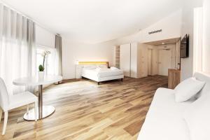 Toscana Charme Resort客房内的一张或多张床位