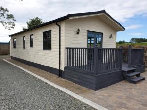 a small white building with a porch at The Cranagh in Coleraine