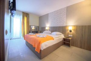 Postel nebo postele na pokoji v ubytování Hotel Piccadilly + 90 fotografií