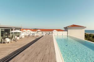 Bazén v ubytování Toscana Charme Resort nebo v jeho okolí