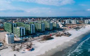 an aerial view of a beach and buildings at Apartamente Azzurro on the beach in Mamaia Sat/Năvodari