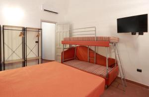 Letto o letti in una camera di Dimora Villa Serena Porto Selvaggio