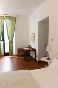Katil atau katil-katil dalam bilik di Santa Croce Exclusive