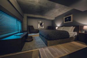 A bed or beds in a room at node hotel
