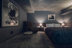 A bed or beds in a room at node hotel