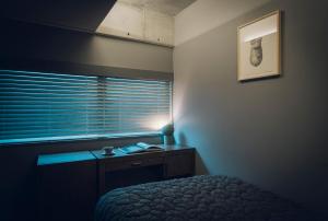 A bed or beds in a room at node hotel