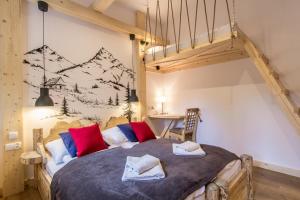 Posteľ alebo postele v izbe v ubytovaní Apartamenty Orkana Centrum Zakopane